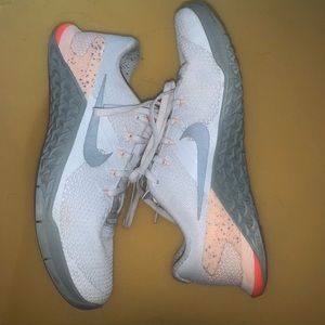 Women’s Nike metcon training shoes.